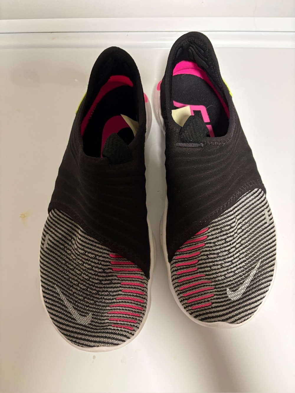 Women's Nike free rn 3.0 Black Slip-On Athletic Shoes with Pink Accents